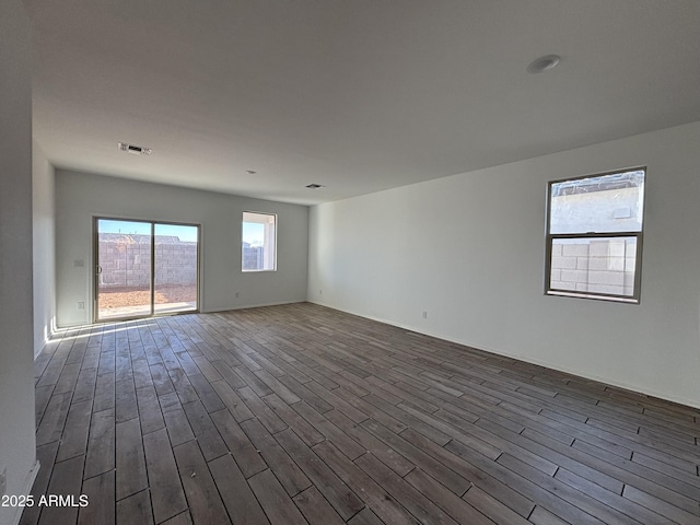 empty room with wood-type flooring