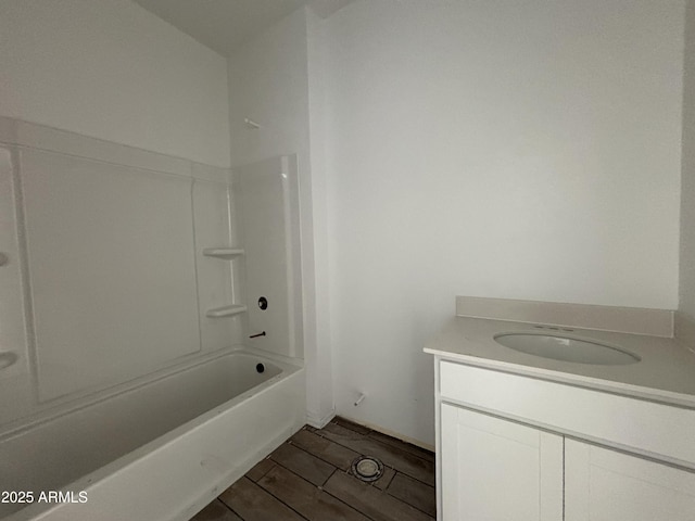 bathroom featuring vanity and bathing tub / shower combination