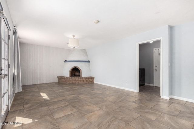 unfurnished living room with a fireplace