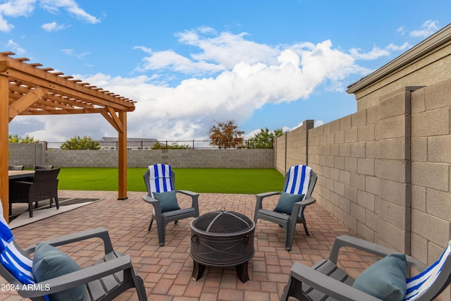 view of patio / terrace featuring a fire pit and a pergola