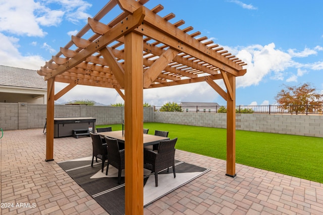 view of patio with a pergola and a hot tub