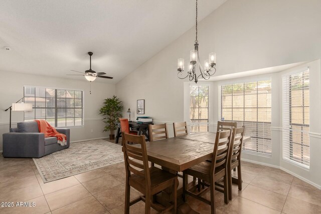 15621 S 37th Way, Phoenix, AZ 85048 - dining space with baseboards, ceiling fan with notable chandelier, high vaulted ceiling, and light tile patterned floors