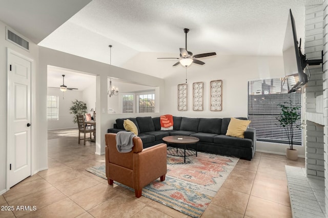 15621 S 37th Way, Phoenix, AZ 85048 - living area with vaulted ceiling, a textured ceiling, ceiling fan with notable chandelier, light tile patterned floors, and visible vents