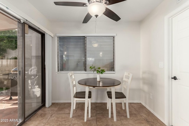 15621 S 37th Way, Phoenix, AZ 85048 - tiled dining room featuring baseboards and ceiling fan