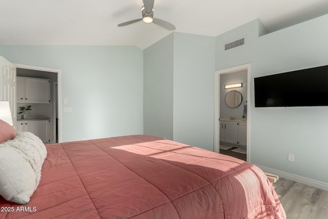 15621 S 37th Way, Phoenix, AZ 85048 - bedroom featuring baseboards, visible vents, lofted ceiling, a ceiling fan, and wood finished floors