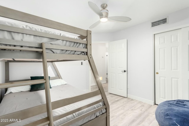 15621 S 37th Way, Phoenix, AZ 85048 - bedroom featuring wood finished floors, visible vents, a ceiling fan, a closet, and baseboards