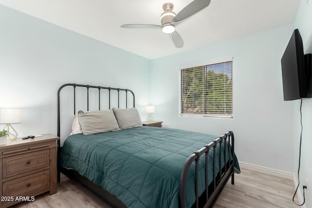 15621 S 37th Way, Phoenix, AZ 85048 - bedroom with light wood-style flooring, baseboards, and a ceiling fan