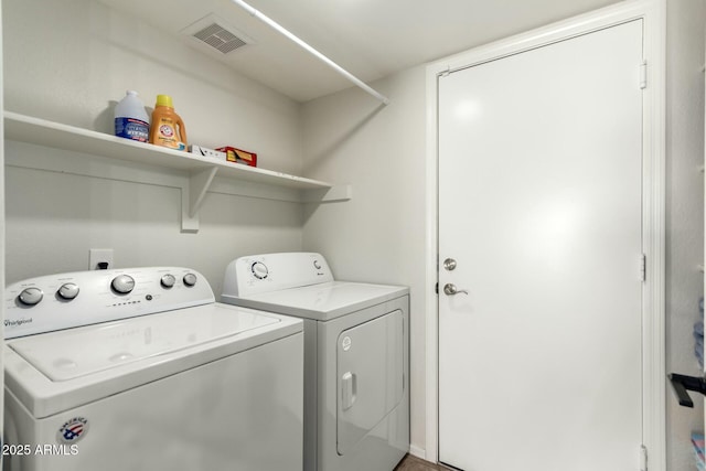 15621 S 37th Way, Phoenix, AZ 85048 - laundry area featuring separate washer and dryer, visible vents, and laundry area
