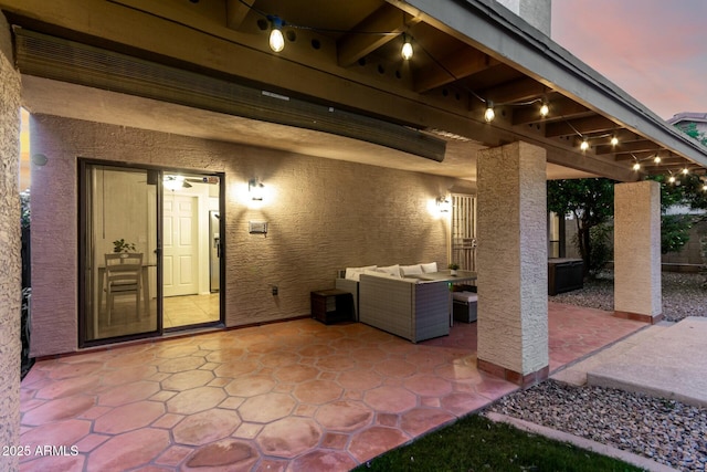 15621 S 37th Way, Phoenix, AZ 85048 - patio terrace at dusk featuring an outdoor living space