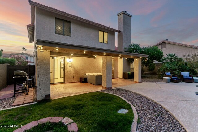 15621 S 37th Way, Phoenix, AZ 85048 - back of property with a fenced backyard, a patio, and stucco siding