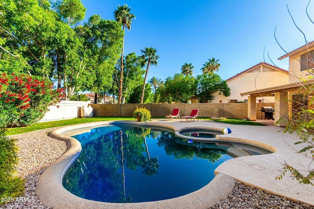 15621 S 37th Way, Phoenix, AZ 85048 - view of swimming pool featuring a pool with connected hot tub, a patio, a fenced backyard, and a grill