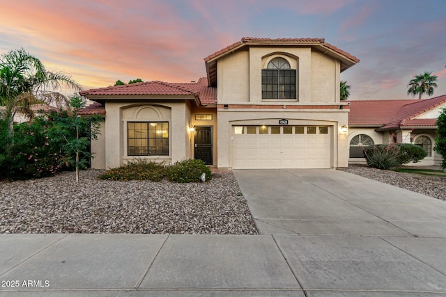 15621 S 37th Way, Phoenix, AZ 85048 - view of front of home featuring stucco siding, a tile roof, concrete driveway, and an attached garage