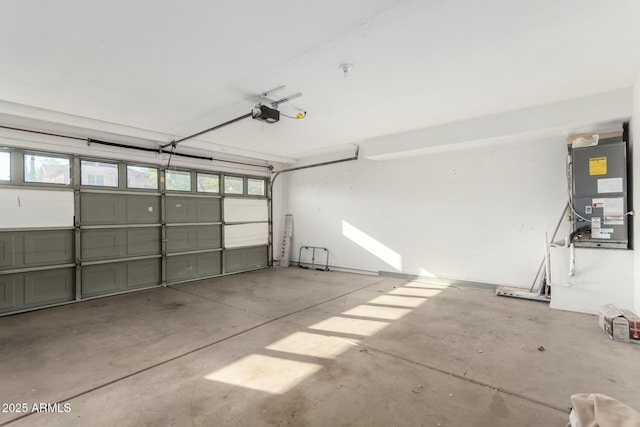15621 S 37th Way, Phoenix, AZ 85048 - garage featuring a garage door opener and heating unit