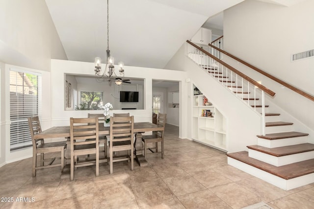 15621 S 37th Way, Phoenix, AZ 85048 - tiled dining room featuring high vaulted ceiling, visible vents, a wealth of natural light, stairs, and a notable chandelier