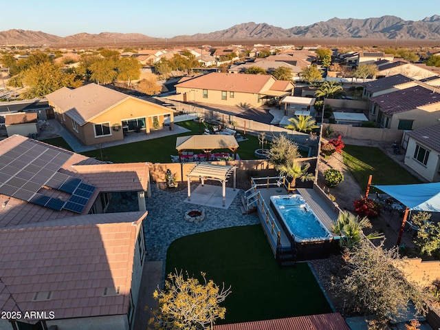 birds eye view of property featuring a mountain view