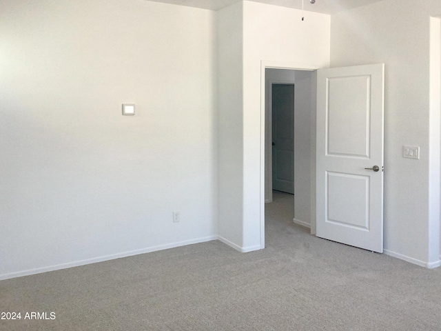 2550 N 149th Ave, Goodyear, AZ 85395 - empty room featuring light colored carpet and baseboards