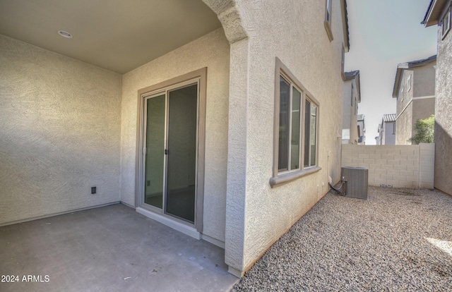 exterior space featuring a patio and central AC unit