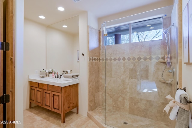 bathroom with vanity, a shower stall, recessed lighting, and tile patterned flooring