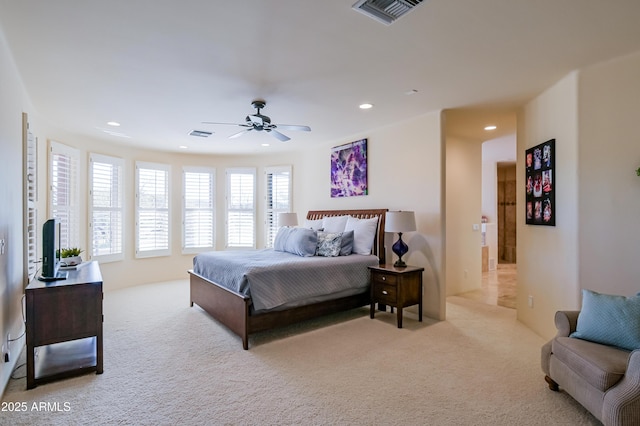 carpeted bedroom with recessed lighting, visible vents, and ceiling fan