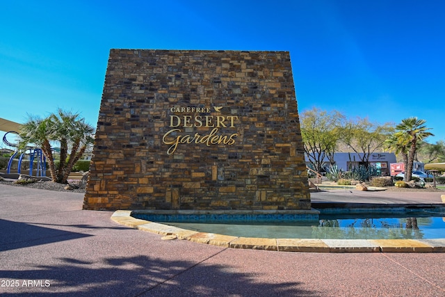 view of community sign