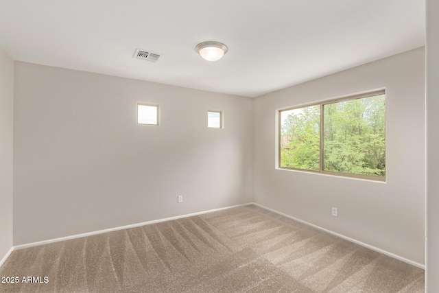 2438 W Via Dona Rd, Phoenix, AZ 85085 - carpeted spare room with baseboards