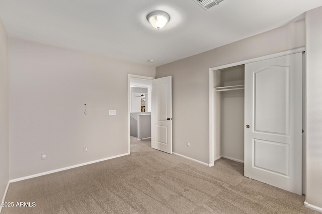 2438 W Via Dona Rd, Phoenix, AZ 85085 - unfurnished bedroom with carpet flooring, a closet, and baseboards