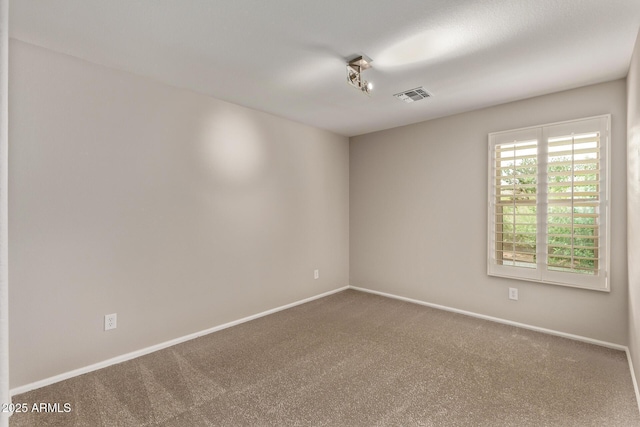 2438 W Via Dona Rd, Phoenix, AZ 85085 - empty room featuring carpet and baseboards