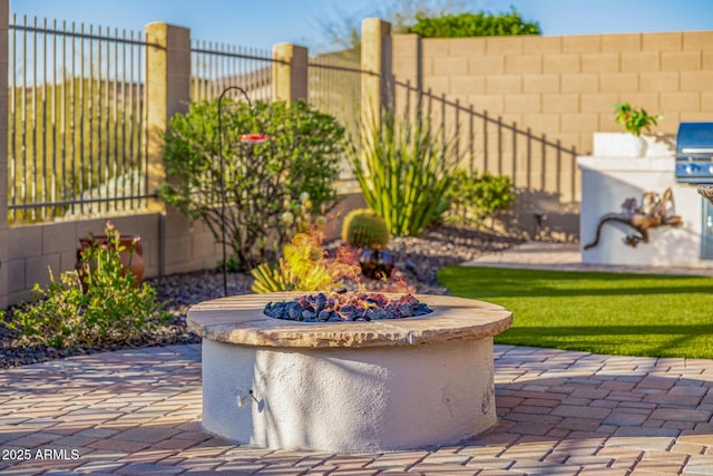 view of patio / terrace featuring fence