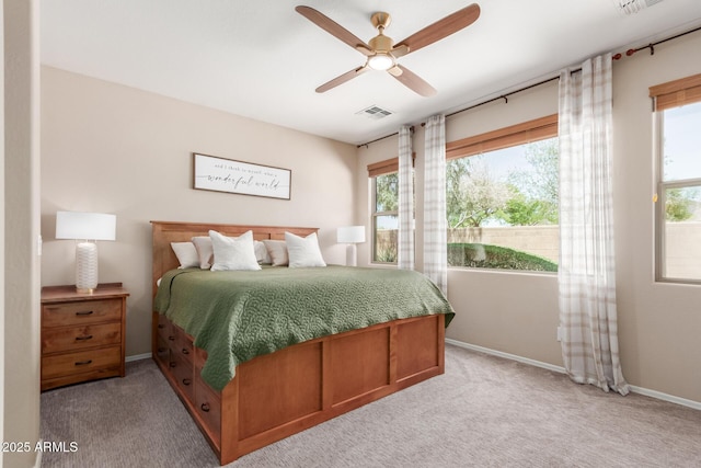 2342 W Owens Ct, Anthem, AZ 85086 - bedroom with light carpet, baseboards, and a ceiling fan