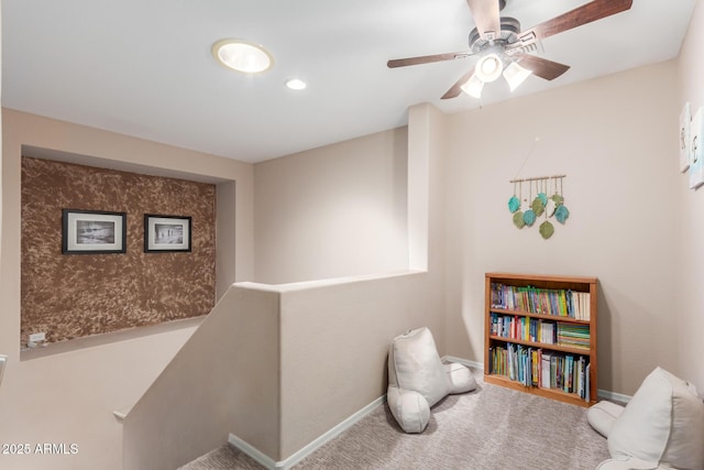 2342 W Owens Ct, Anthem, AZ 85086 - living area with baseboards, carpet floors, a ceiling fan, and an upstairs landing