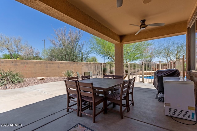 2342 W Owens Ct, Anthem, AZ 85086 - fenced backyard with a ceiling fan, a patio, and outdoor dining space