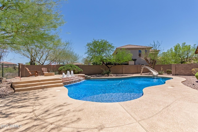 2342 W Owens Ct, Anthem, AZ 85086 - view of pool featuring a water slide, a fenced backyard, and a patio