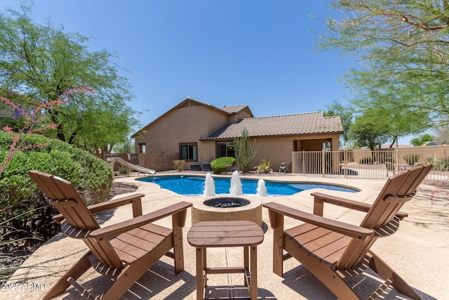 2342 W Owens Ct, Anthem, AZ 85086 - view of pool featuring a water slide, an outdoor fire pit, and a patio area