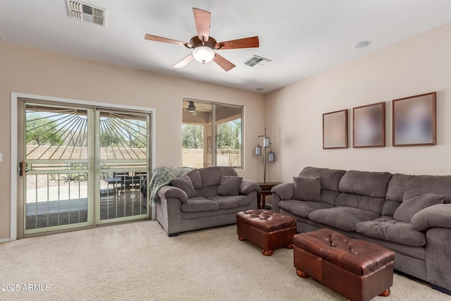 2342 W Owens Ct, Anthem, AZ 85086 - living area featuring healthy amount of natural light, carpet floors, and a ceiling fan