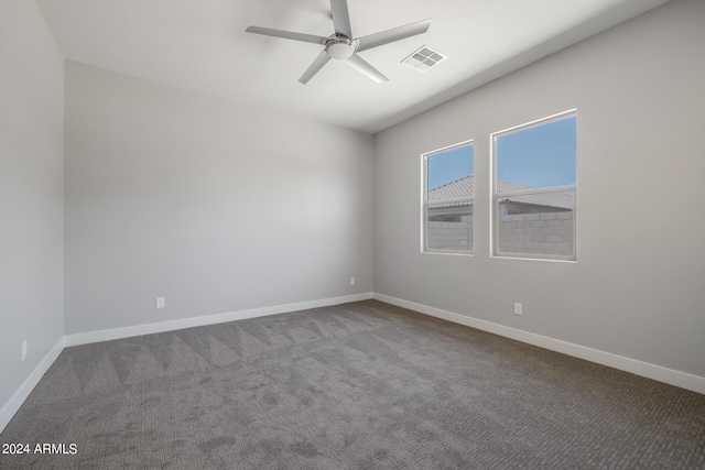 spare room with carpet flooring and ceiling fan