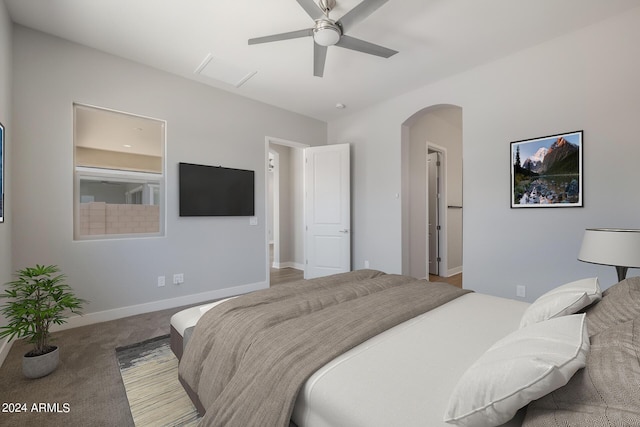 bedroom with ceiling fan and carpet