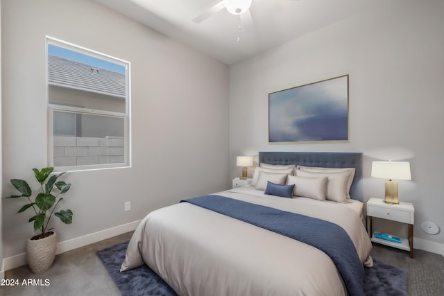 carpeted bedroom with ceiling fan