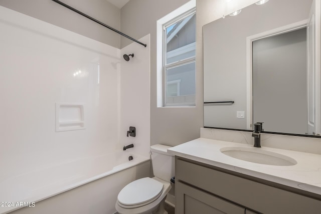 full bathroom featuring vanity, toilet, and shower / bath combination