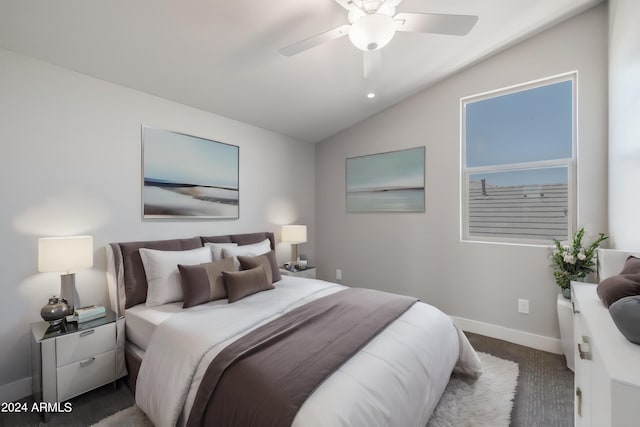 bedroom with ceiling fan and vaulted ceiling