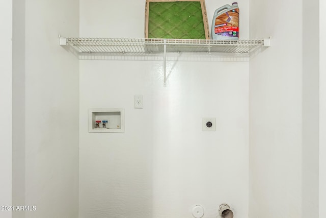 washroom with hookup for a washing machine, gas dryer hookup, and electric dryer hookup