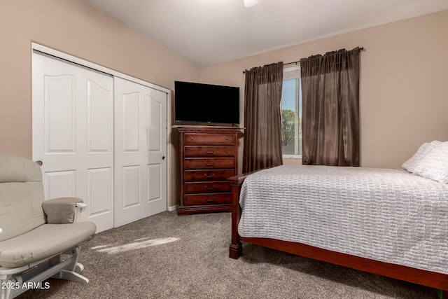 carpeted bedroom featuring a closet