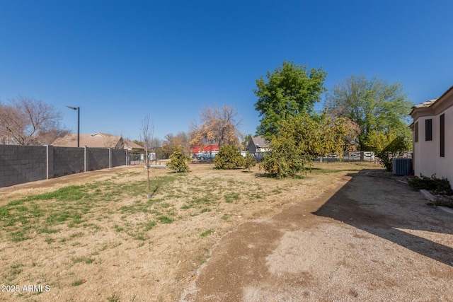 view of yard with central AC