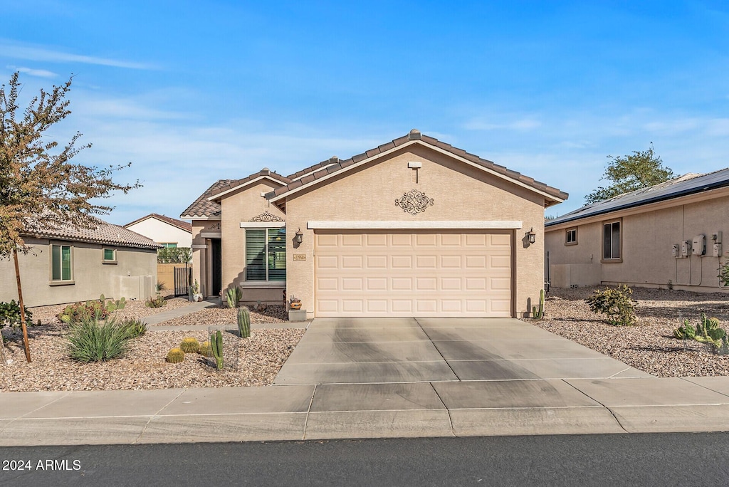 view of front of home featuring a garage