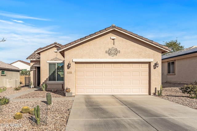 single story home with a garage