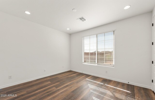 32076 N 136th Ave, Peoria, AZ 85383 - unfurnished room with baseboards, visible vents, recessed lighting, and dark wood finished floors