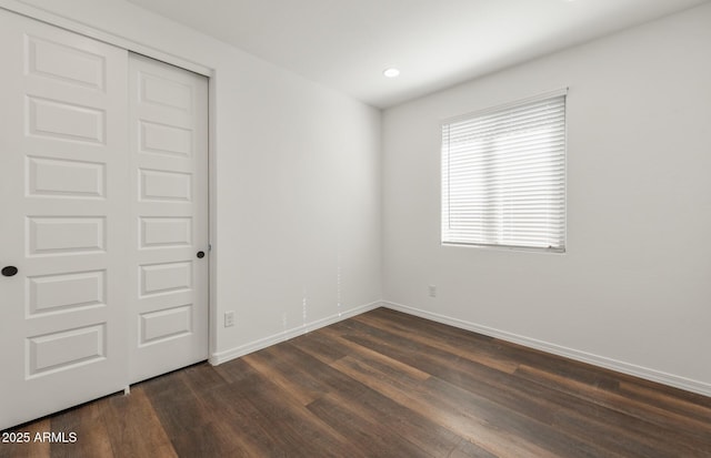 32076 N 136th Ave, Peoria, AZ 85383 - empty room featuring baseboards, dark wood-style floors, and recessed lighting