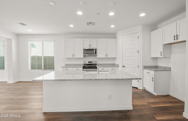 32076 N 136th Ave, Peoria, AZ 85383 - kitchen featuring a sink, appliances with stainless steel finishes, light stone counters, and visible vents
