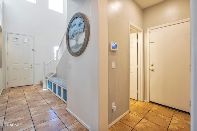 entrance foyer featuring light tile patterned floors