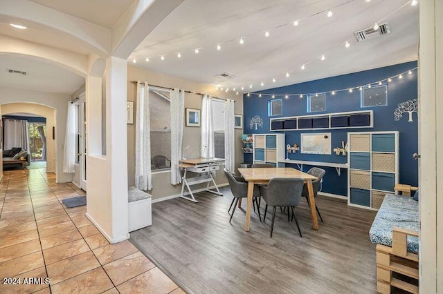 dining room with light wood-type flooring