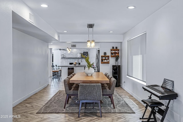 dining area featuring wine cooler, visible vents, baseboards, and recessed lighting